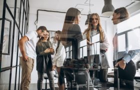 Group of people working out business plan in an office